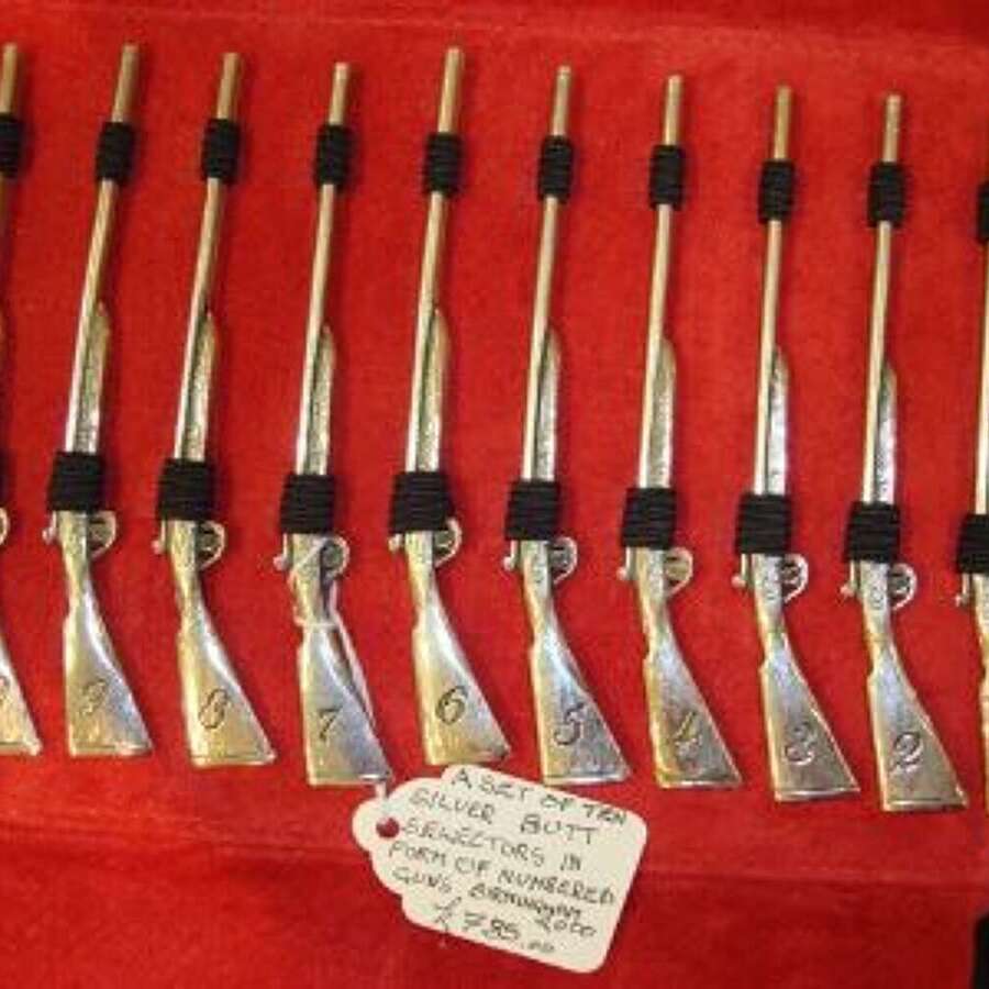 A Set of Ten Silver Butt Markers
