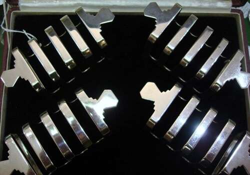A Set of Four Toast Racks.