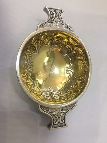 A William IV silver gilt quaich.