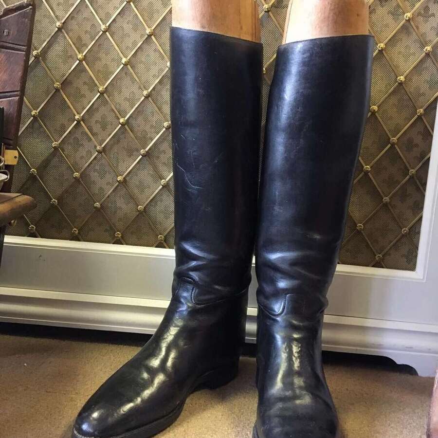 A Pair of Black Leather Riding Boots