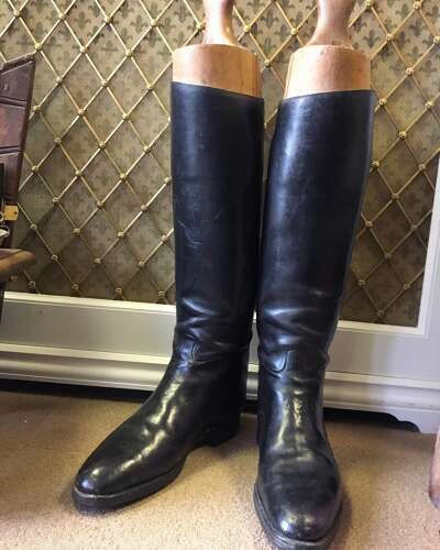 A Pair of Black Leather Riding Boots