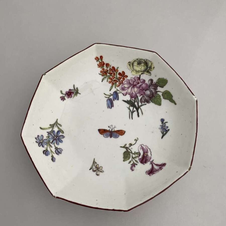A Chelsea red anchor period octagonal dish.