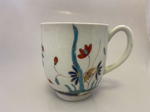 An early Worcester coffee cup painted with the Kempthorne pattern style, circa 1768.