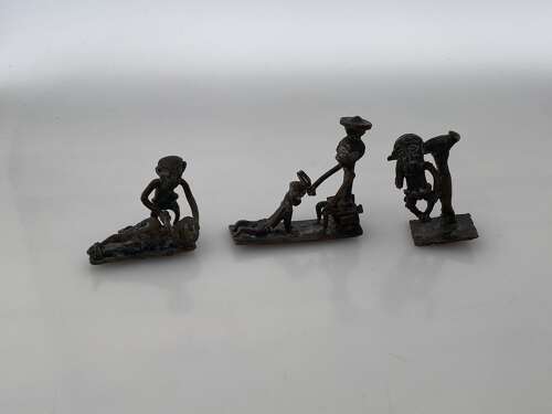 A set of three Asante gold weights.