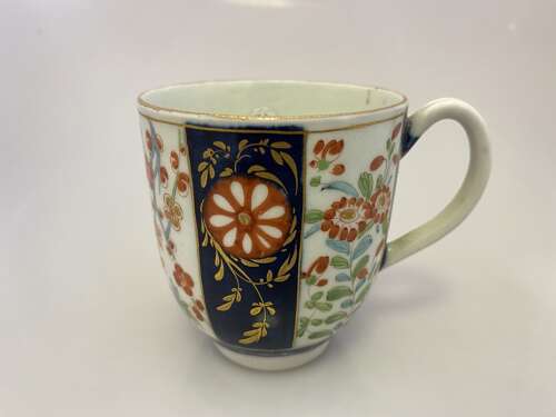 An early Worcester coffee cup painted with the Rich Queen's pattern, circa 1768.