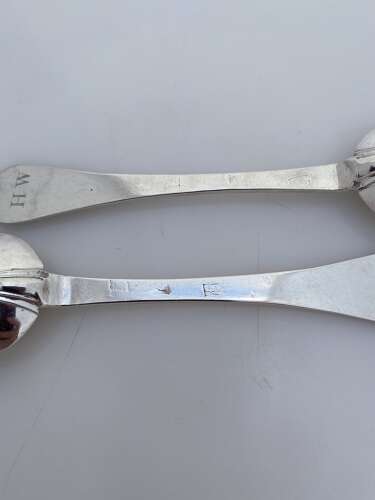 A pair of Queen Anne silver trifid rat tail spoons, London 1702.