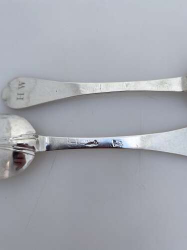 A pair of Queen Anne silver trifid rat tail spoons, London 1702.