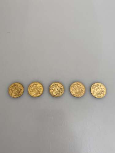 Gold sovereigns dated 1913.
