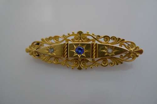 A 15ct gold, sapphire and spinel brooch.