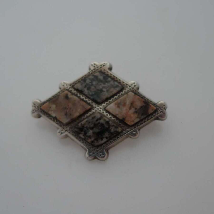A Scottish silver and marble brooch.Circa 1900.