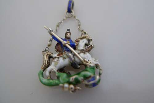 Austro-Hungarian silver and enamel pendant of St. George slaying the dragon.