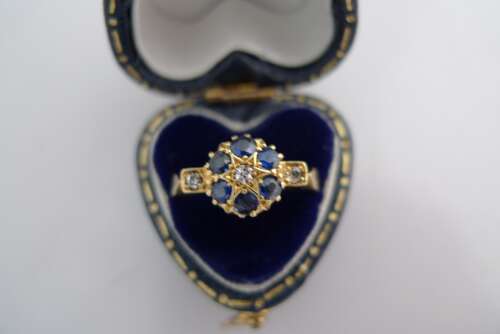 An 18ct Gold, Diamond and Sapphire ring.