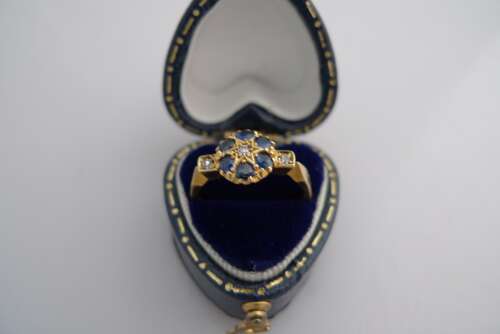 An 18ct Gold, Diamond and Sapphire ring.