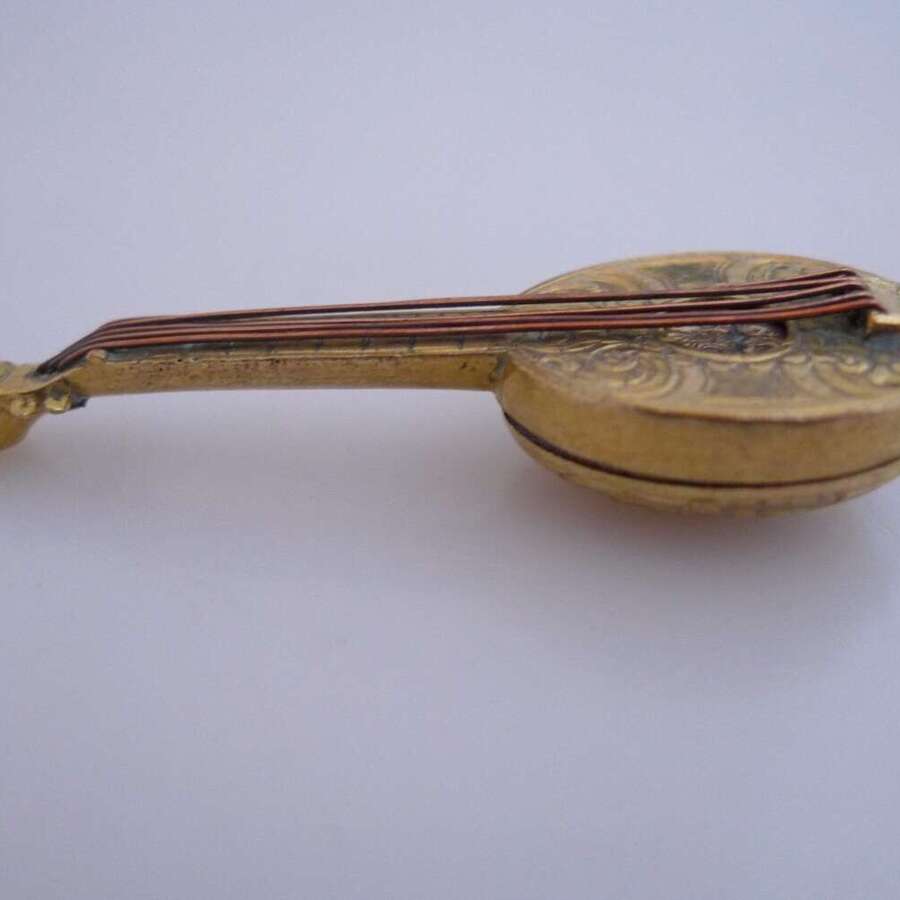 A Gilt Mandolin Vinaigrette.
