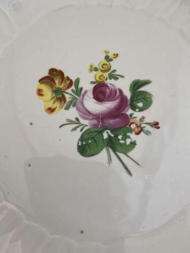 A Vienna plate painted with flowers, circa 1765.