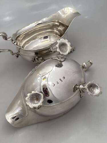 A pair of heavy George II silver sauce boats, 1752.