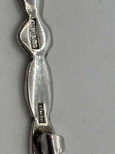 Silver kilt pin with ship and celtic design.