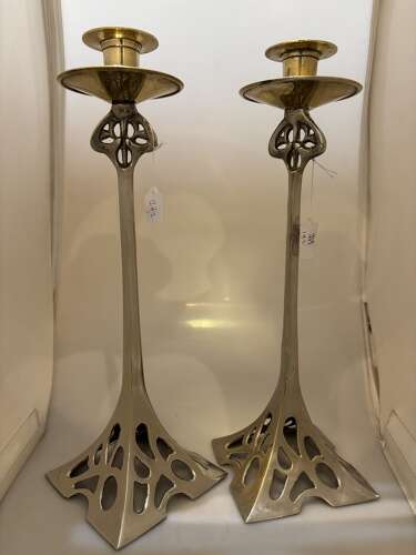 Pair of Tudric style Art Nouveau candlesticks.