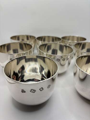 Set of Eight Silver Tumbler Cups.