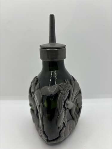 Green glass bottle with pouring spout by Georg Nillson, Gero. Circa 1930.